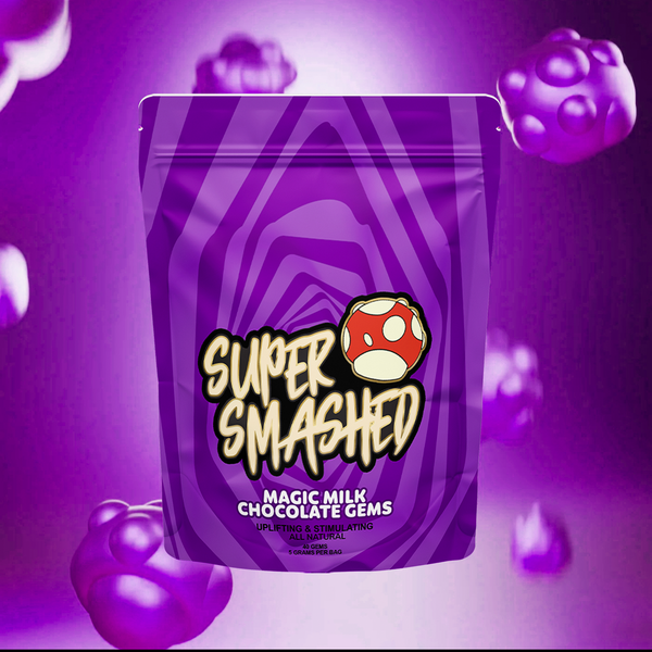 Purple resealable Super Smashed Milk Chocolate Gems pouch shown from the front against a purple background with floating gems.
